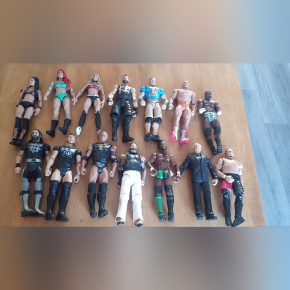 WWE Action Figures Set - Black, White, Red, Green - Picture 1 of 1